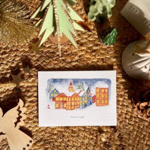 Chemin de table Ethnique Lin 3 Un village illuminé sous la neige, parfait pour accompagner vos cadeaux de fin d’année ou pour envoyer un petit mot doux.